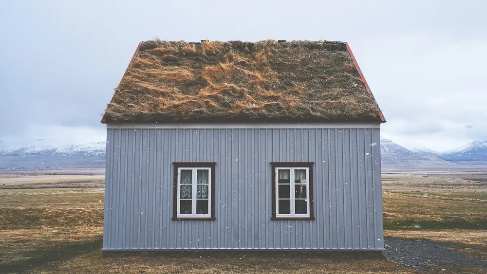 Turf-roofed house in the snow